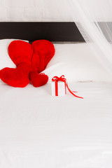 Gift box laying on bed © OlgaKhorkova
