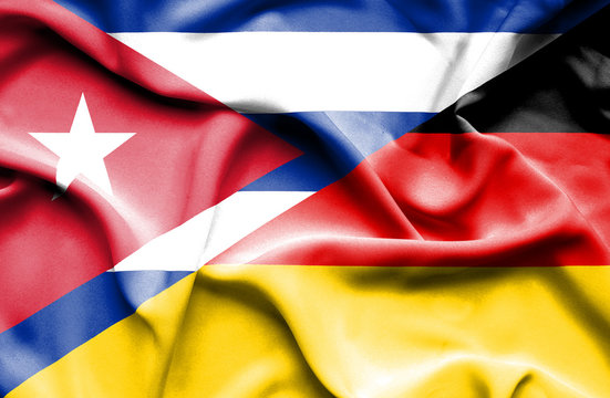 Waving flag of Germany and Cuba