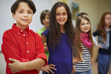 Group of pupils standing next to the whiteboard
