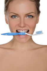 Portrait beautiful woman with toothbrush in teeth