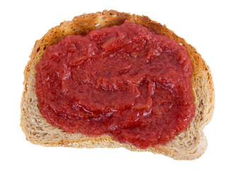 Slice of toast bread with rhubarb and strawberry jam over white background