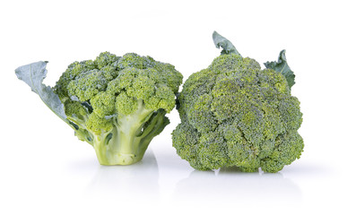 Two broccoli on a white background