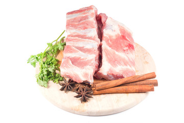 Raw Pork Ribs ,coriander, star anise, Cinnamon sticks on white background 
