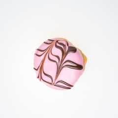 Strawberry flavored donut. Topped with chocolate