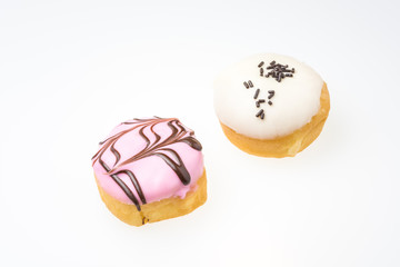 Strawberry flavored donut and white Chocolate flavored donut