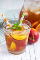 Glass of refreshing homemade nectarine iced tea