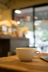 coffee latte art in cofeee sbop vintage color tone