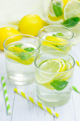 Fototapeta na wymiar Homemade lemonade with fresh lemon and mint