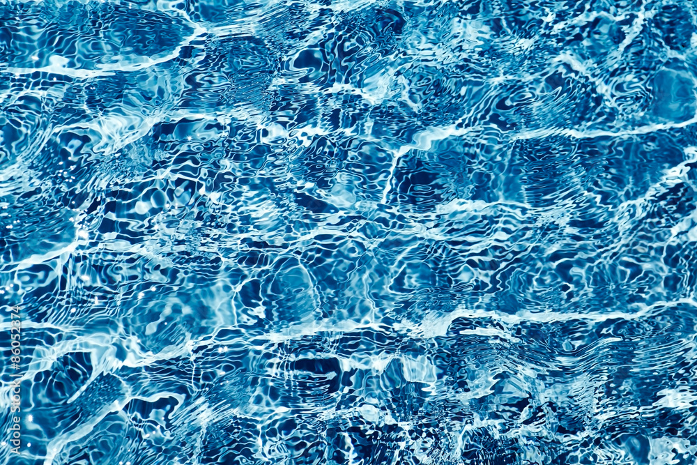 Wall mural Blue ripped water in swimming pool