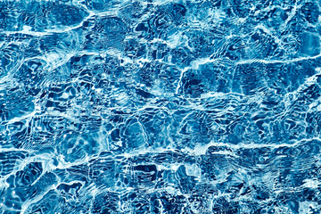 Blue ripped water in swimming pool