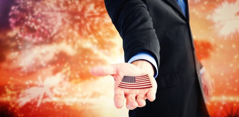 Businessman holding out his hands to the camera