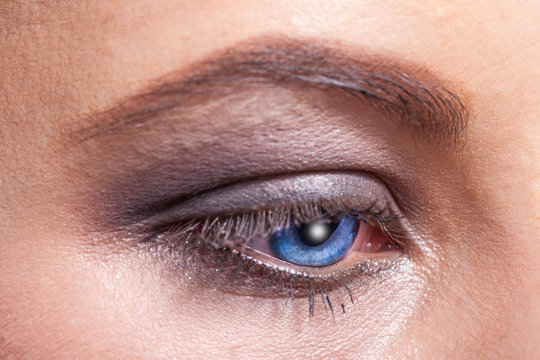 Close up of a blue woman eye