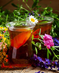 Black tea with lemon and herbs in an authentic Middle Eastern gl