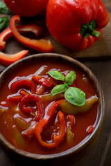 Close-up of hungarian lecho in a wooden bowl, selective focus