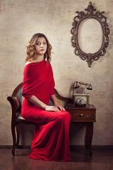 Portrait of girl in a red dress