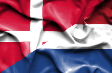 Waving flag of Netherlands and Denmark