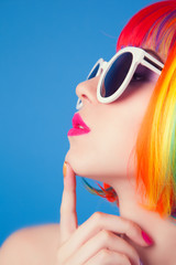 beautiful woman wearing colorful wig