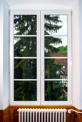 Big pvc window with decoration elements in old french house