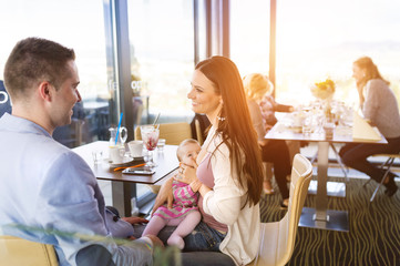 Young parents with their daughter