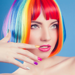 beautiful woman wearing colorful wig