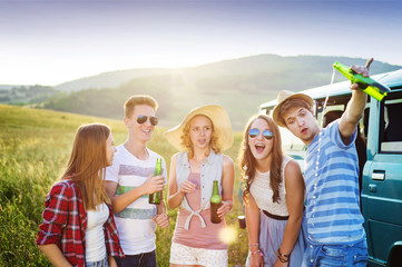 Young hipster friends on road trip