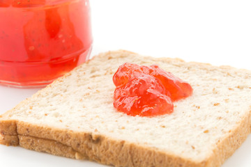 whole wheat bread with strawberry jam