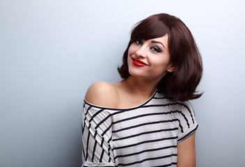 Fototapeta premium Happy casual young smiling woman with short hairstyle looking