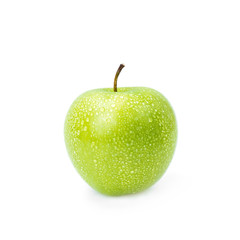 Green apple with water drops on white background.