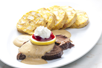 sirloin on cream with dumplings