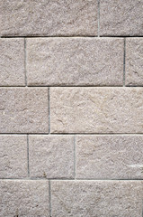 Decorative relief cladding slabs imitating stones on wall