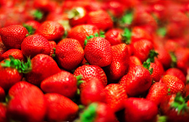 Strawberry  background on a market stall close-up. Food healthy