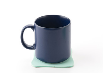 cup and coaster on white background