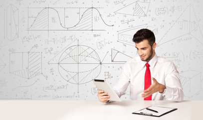 Businessman with business calculations background