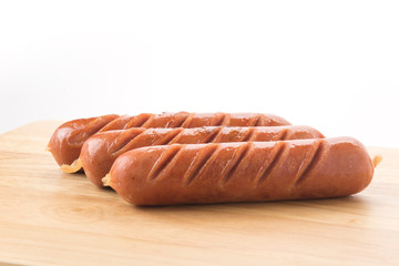 grill sausage on wood board