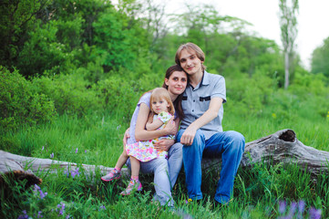 Mother, father and daughter