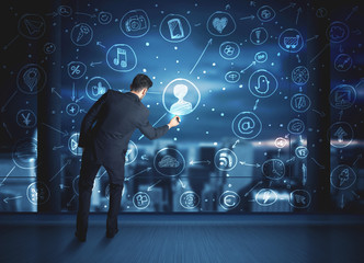 Businessman drawing social media connection scheme