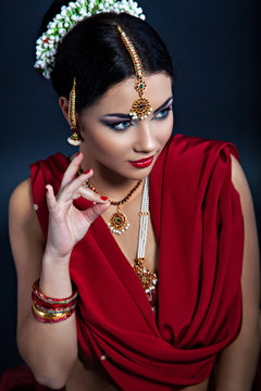 Closeup portrait of young beautiful woman in indian style