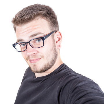 Happy Young Man Taking A Selfie Photo. Isolated On White Background