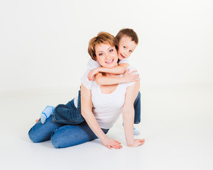 Fototapeta premium Mother and her son sitting together