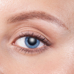Obraz premium Close up of a blue woman eye
