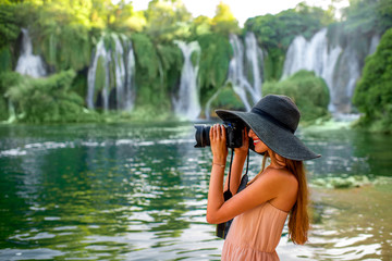 Woman tourist near Kravica waterfall