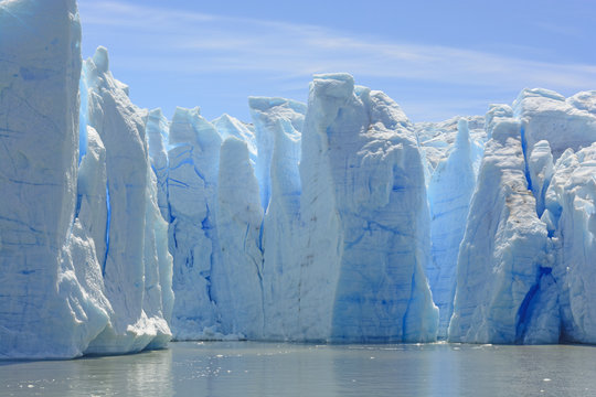 Blue Ice Columns on the Water