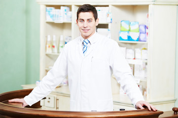 Pharmacy chemist man in drugstore