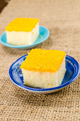 Golden cake on blue dish