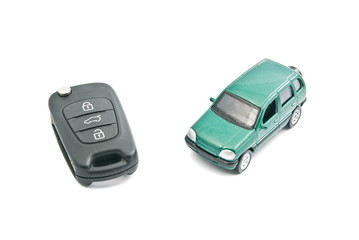 Green car and car keys with alarm