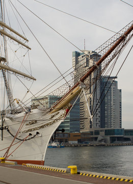 Beautiful big ship with huge sky scrappers on the background in Gdansk (Poland)