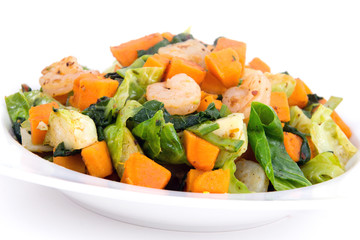 Sweet potato casserole with greens and shrimps