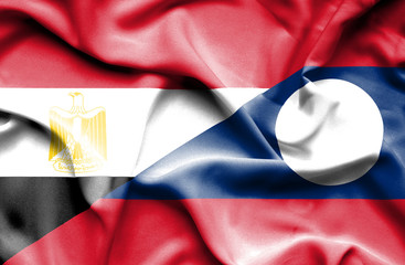 Waving flag of Laos and Egypt