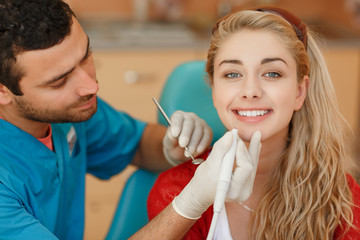 Woman patient at dentist dental clinic teeth care