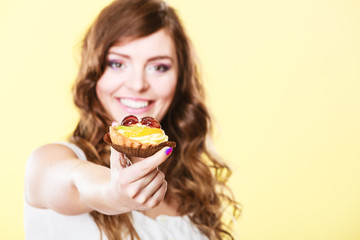 Cupcake cake in woman hand. Sweet food.